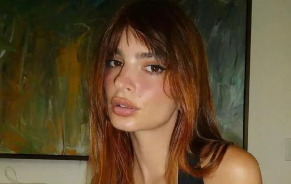 Emily Ratajkowski Stuns in Plunging Black Swimsuit: Glamorous Loungewear Goals