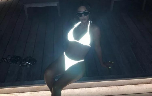 Kim Kardashian Glows in the Dark with Neon Bikini Snap